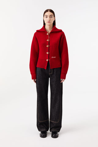 CARDIGAN WITH CHAIN-BUTTON FASTENING